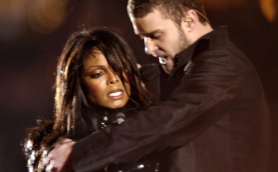 Janet Jackson and Justin Timberlake perform on stage.