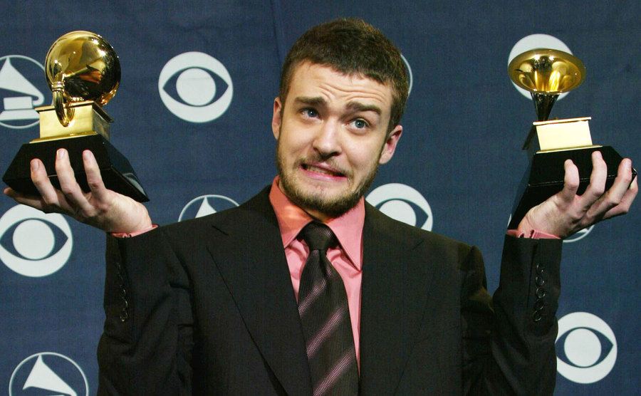 Justin Timberlake poses backstage at the Grammys.