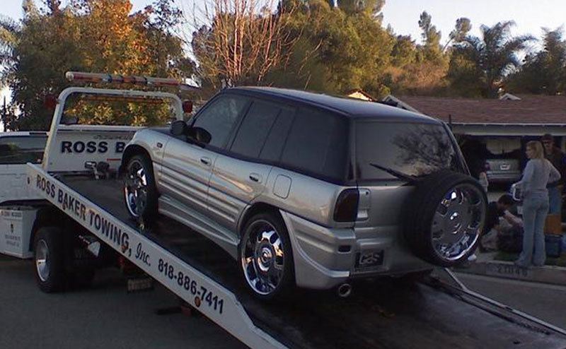 A picture of Justin Dearinger’s car being towed.