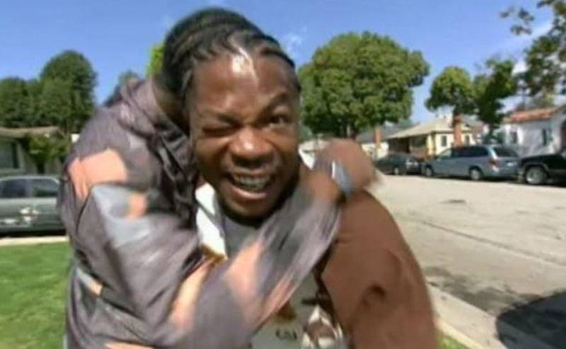 Xzibit surprises a participant in a still from the show.