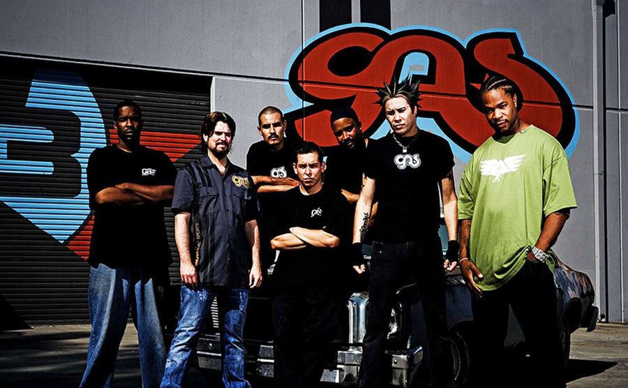 The cast from West Coast Customs and Xzibit pose for a portrait.