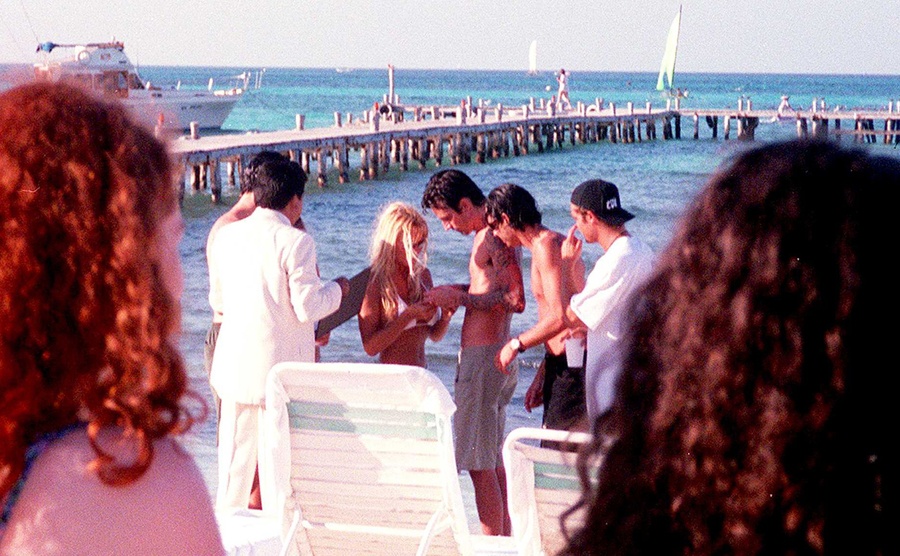 Pamela Anderson and Tommy Lee get married on the beach. 