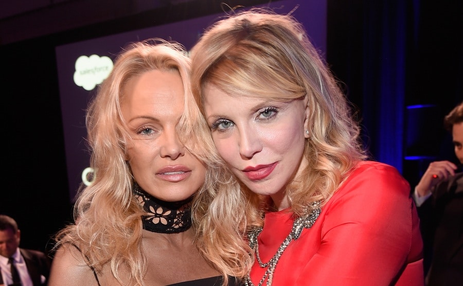 Pamela Anderson and Courtney Love attend an event. 