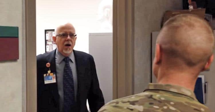 Son surprising his father at work