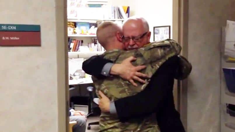 soldier son hugging his father