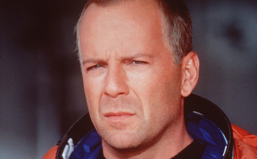 A portrait of Bruce Willis in the character of Harry S. Stamper.