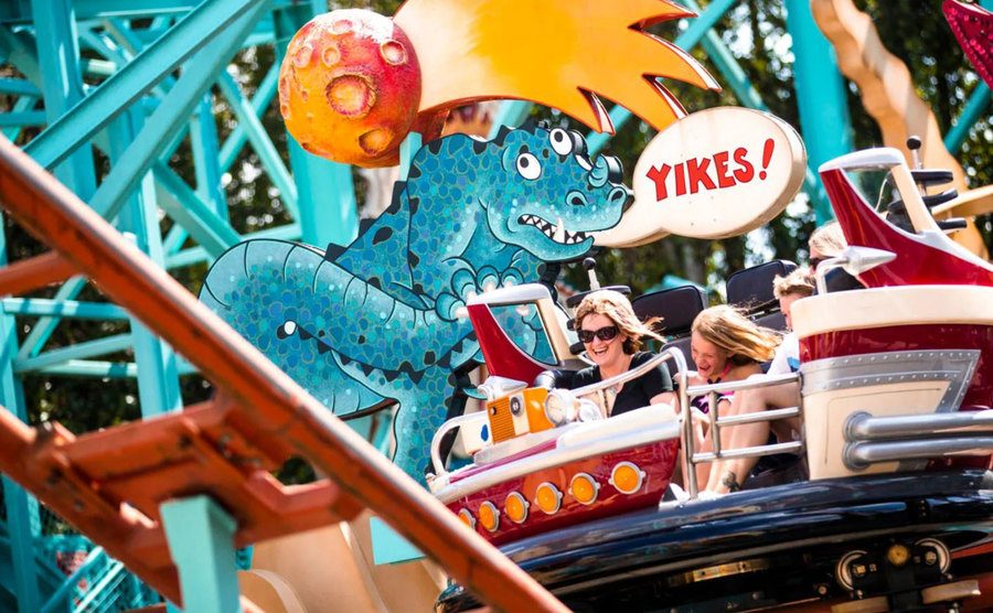 An image of passengers at The Primeval Whirl Ride.