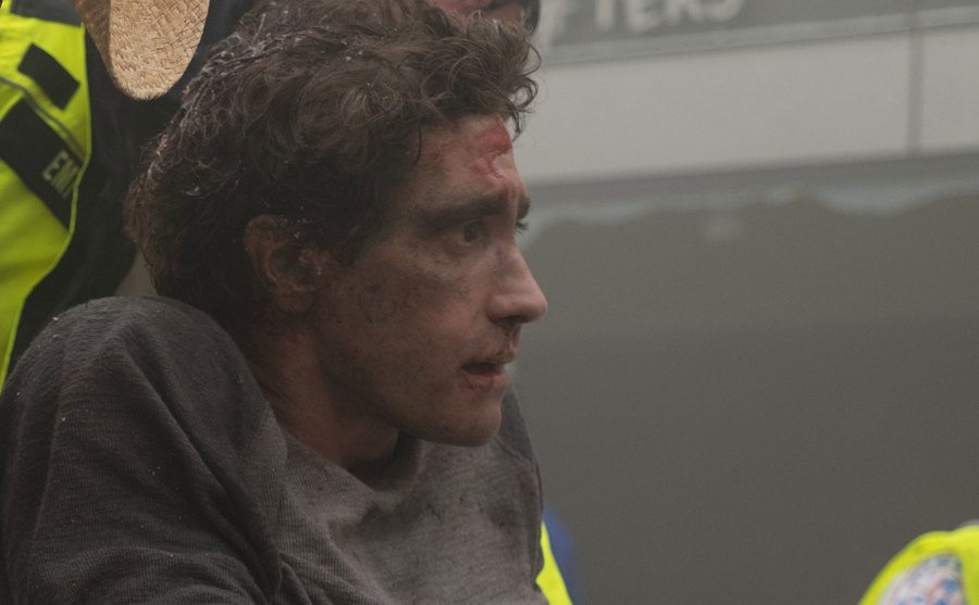 Jake Gyllenhaal is in a wheelchair after escaping a fire in a still from the film Stronger. 