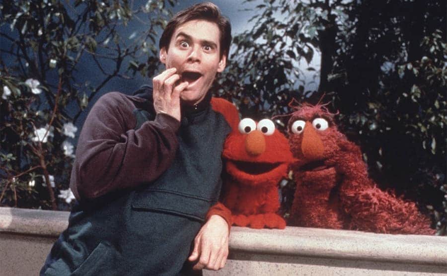 Jim Carrey on Sesame Street with Elmo and another puppet 