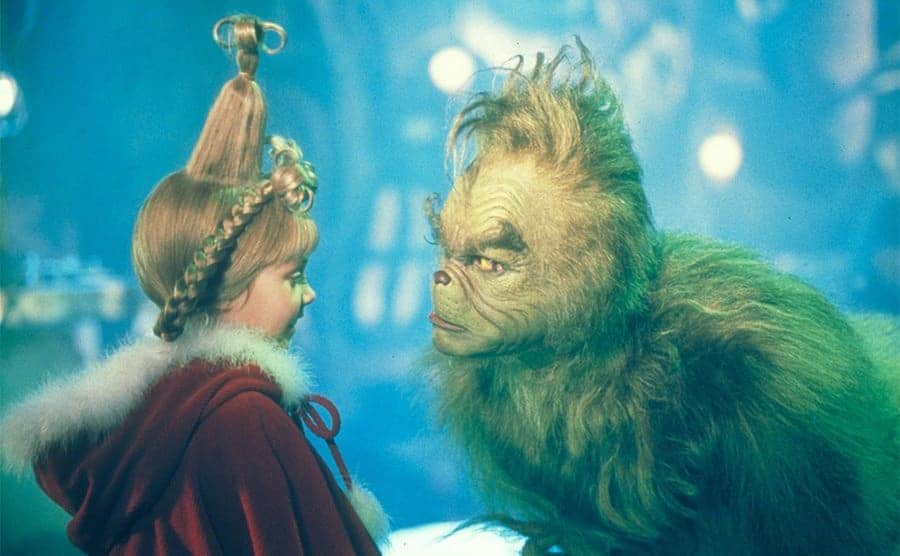 Jim Carry as the Grinch with Taylor Momsen in How The Grinch Stole Christmas 2000