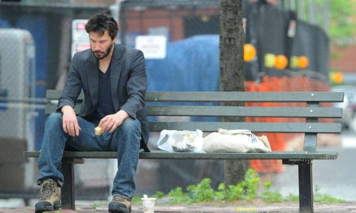 Keanu reeves sitting