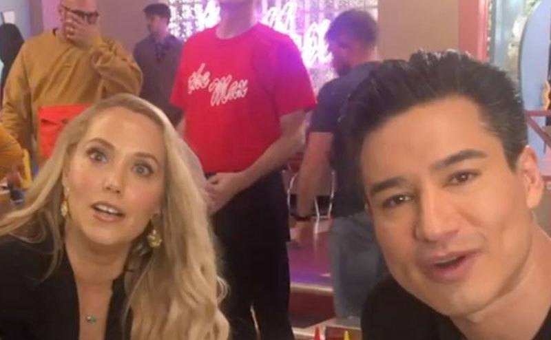 Berkley and Mario Lopez take a picture together.