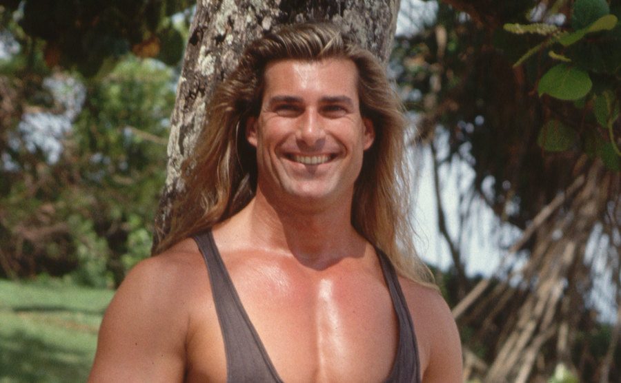 A photo of Fabio modeling during a photoshoot.