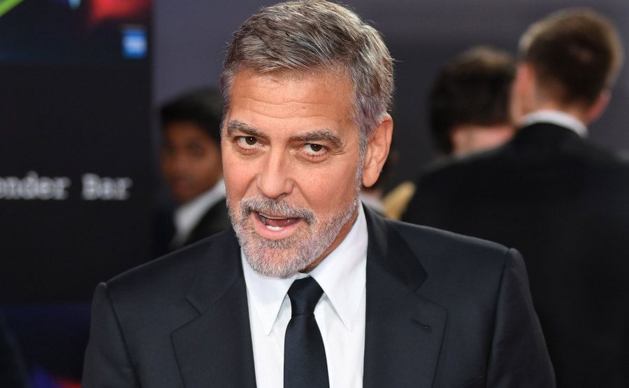Clooney speaks to the media.
