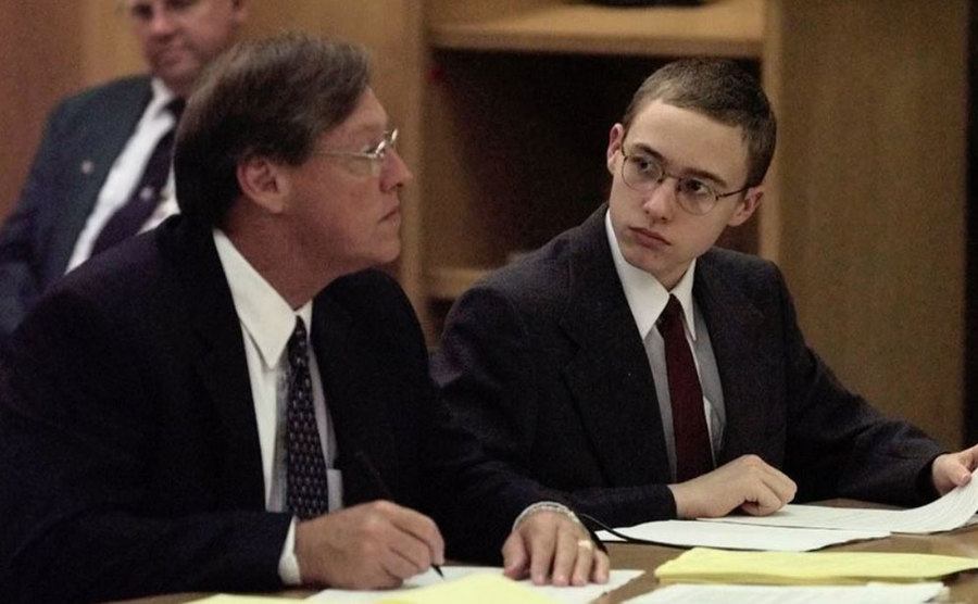 A photo of Josh and his lawyer during the trial.