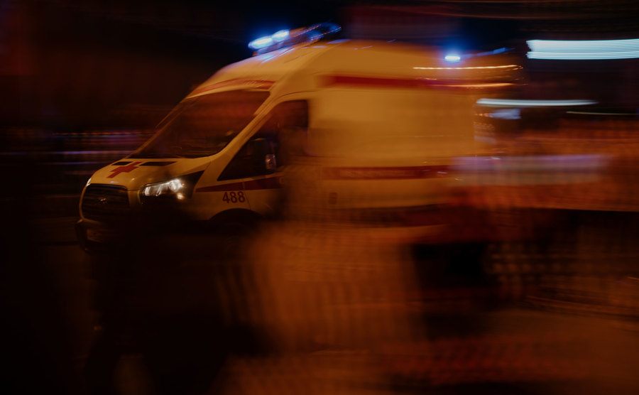 An image of an ambulance rushing to a hospital.