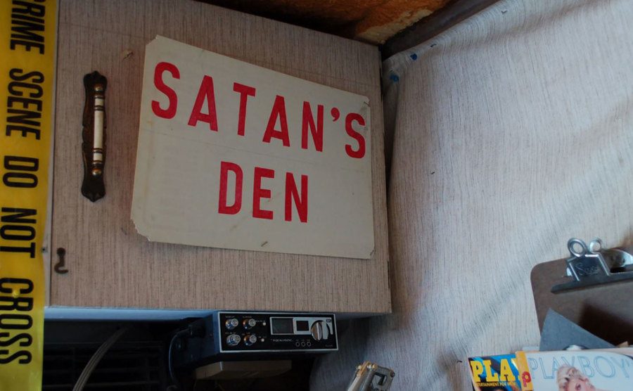 A photo of a sign inside the trailer where Ray tortured his victims. 