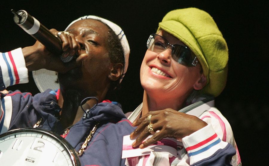 A photo of Flav and Nielsen on stage.