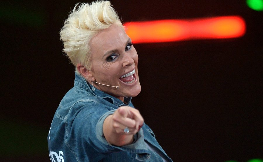 Brigitte Nielsen poses for the press on stage.