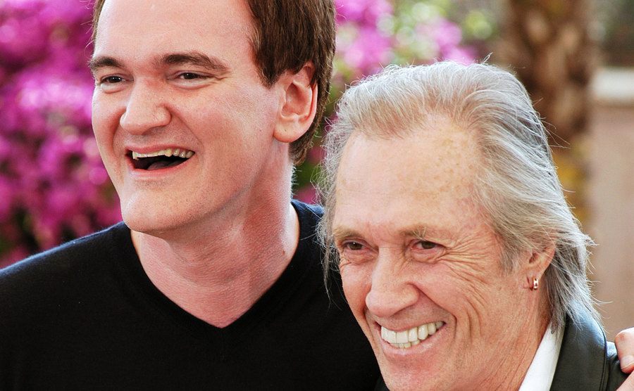 A picture of Quentin Tarantino and Carradine.