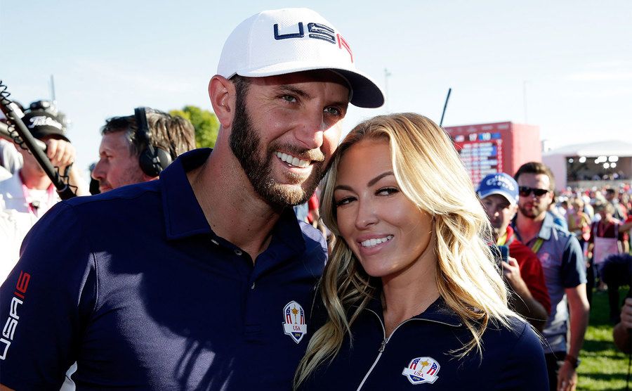 Dustin Johnson and Paulina Gretzky celebrate after winning the Ryder Cup. 