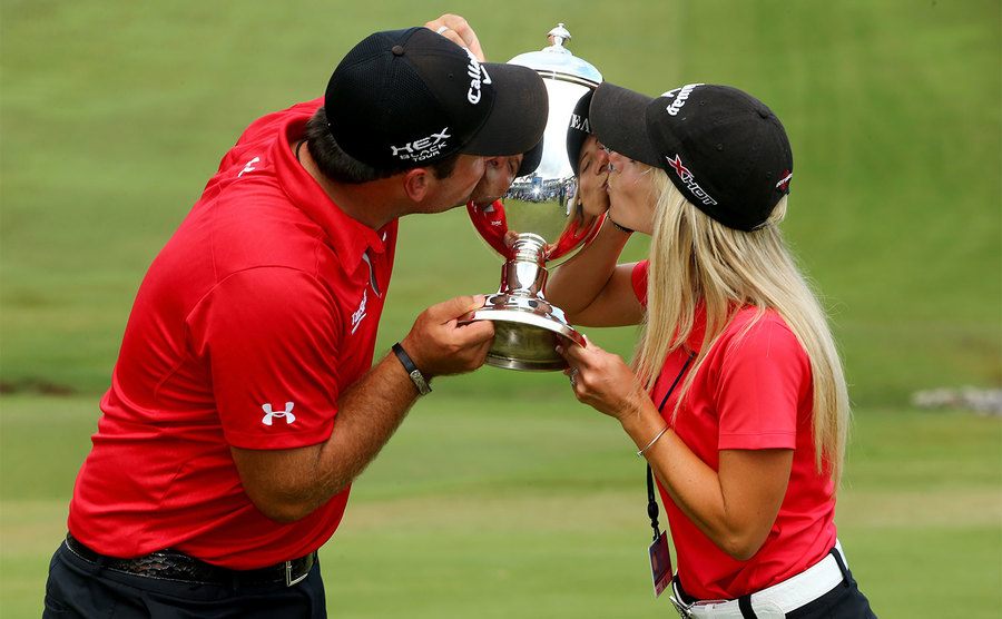 Patrick Reed and his wife Justine celebrate his win.