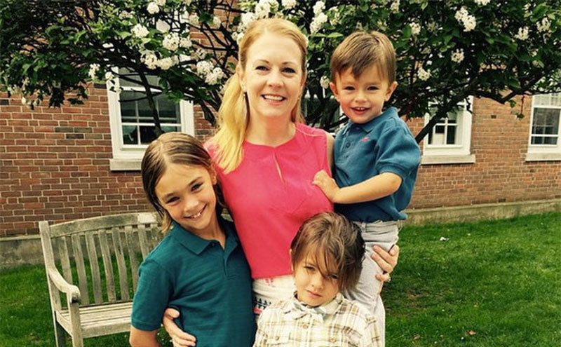 Hart poses for a picture with her sons. 