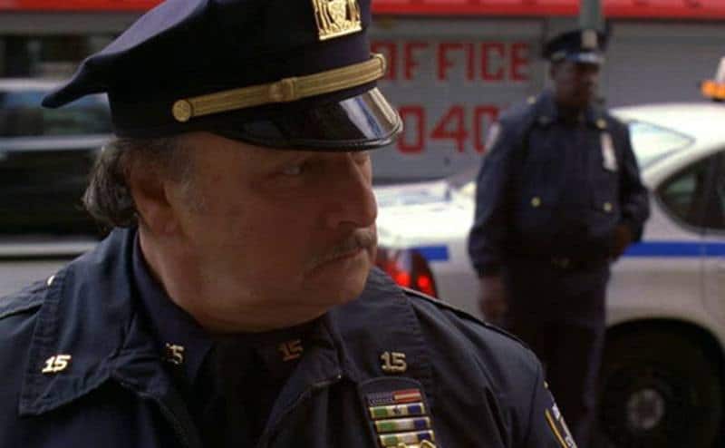 A still from the police in the street in a scene from the show.