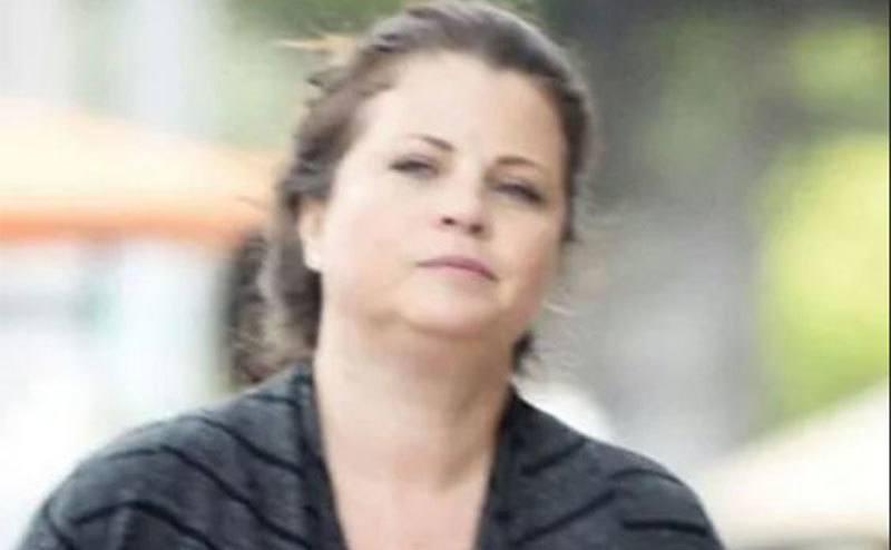 A current picture of Yasmine Bleeth in the street.