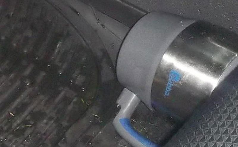 A photo of the coffee mug inside the car.