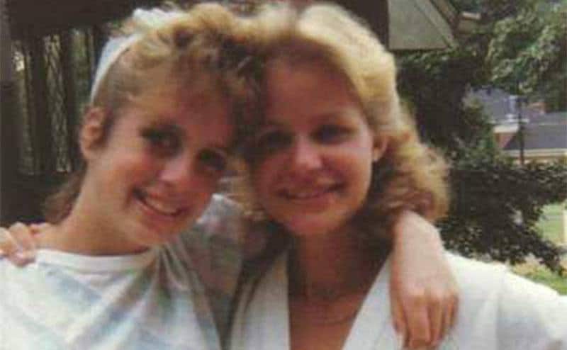 A dated picture of Suzanne with a friend.