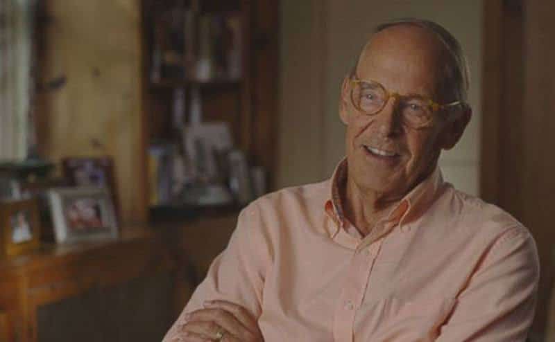 A video still from an interview with one of the surgeons who treated John at the ER.