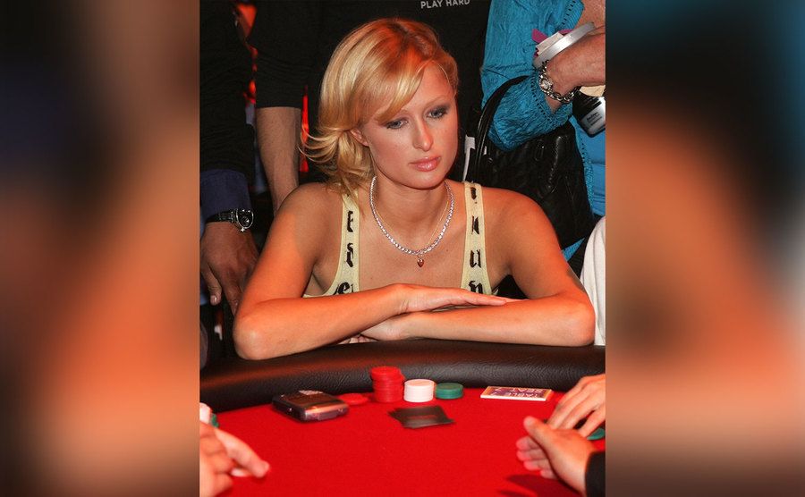 Paris Hilton plays poker. 