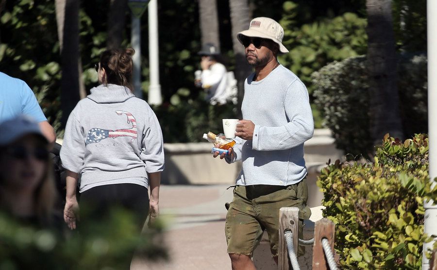 A photo of Gooding Jr. walking the street.