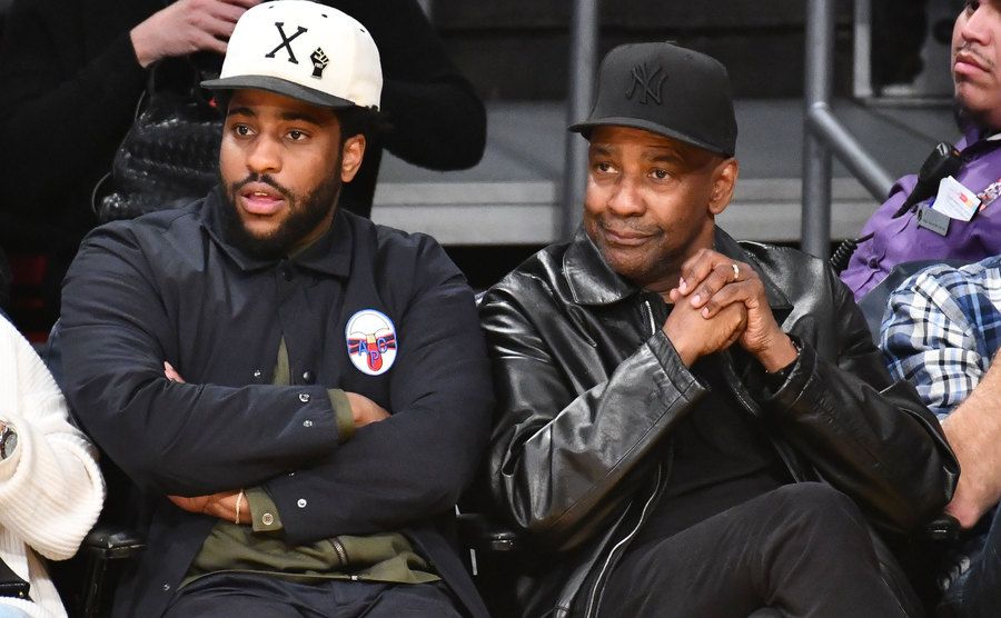 Malcolm and Denzel Washington attend a basketball game.