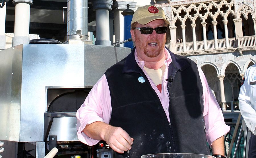 An image of Batali cooking during an event.