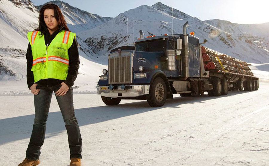 A promotional still of a female truck driver in Ice Road Trucker.