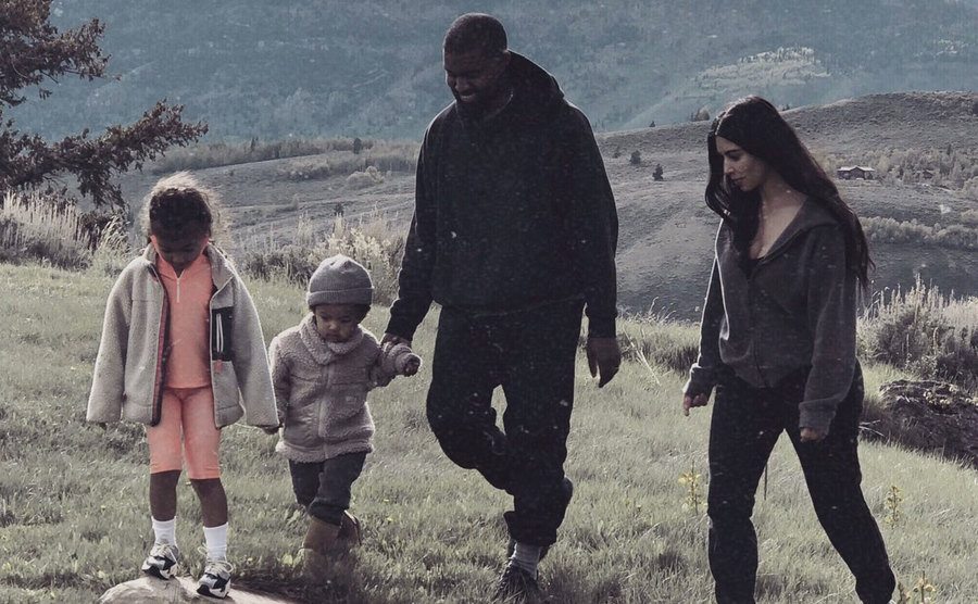 Kim and Kanye go on a hike with their kids. 