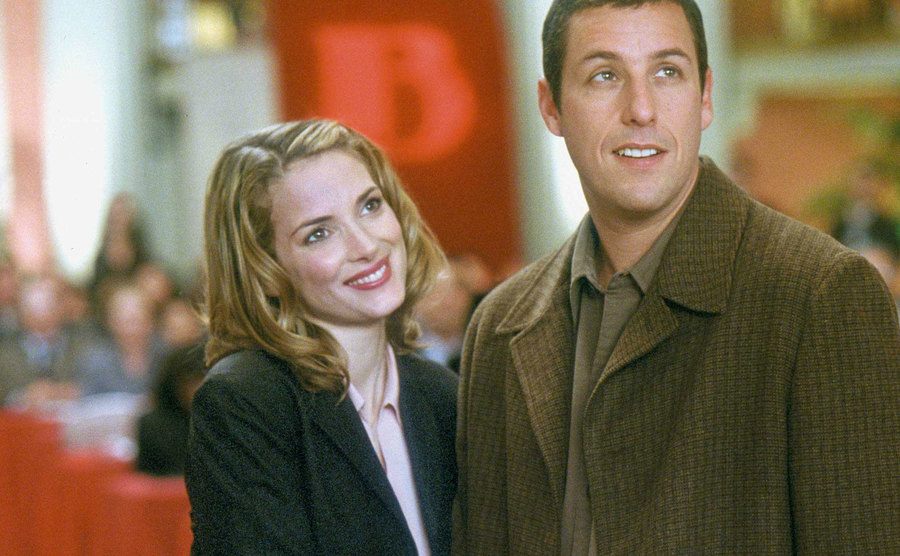 A still of Winona Ryder and Adam Sandler in a scene from Mr. Deeds.
