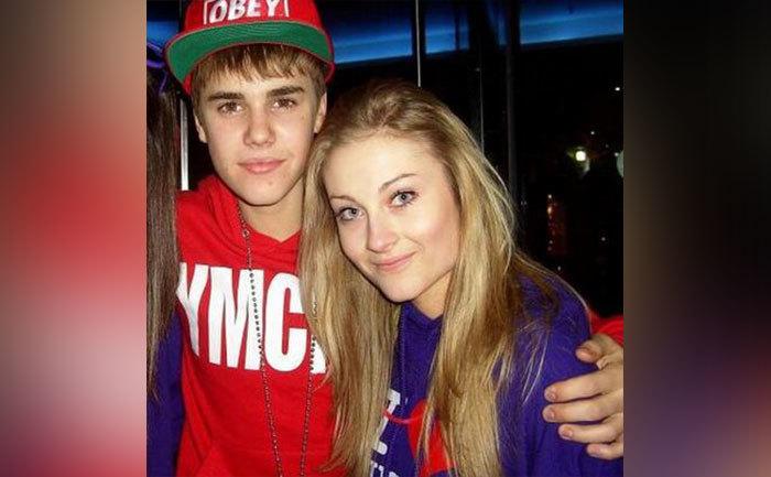 Justin Bieber poses for a photo with Mariah Yeater. 