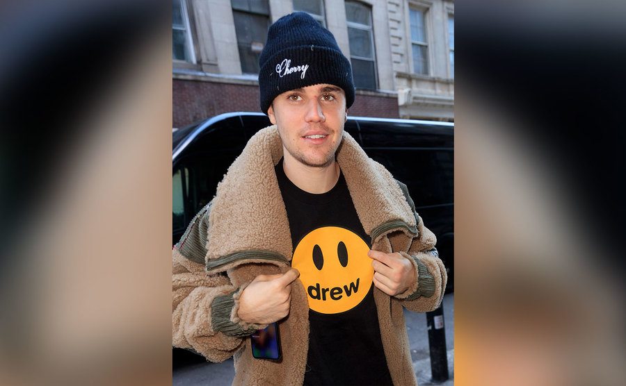 Justin Bieber shows off a 'Drew' shirt while out and about. 