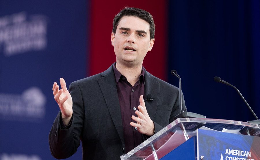 Ben Shapiro speaks at a convention. 