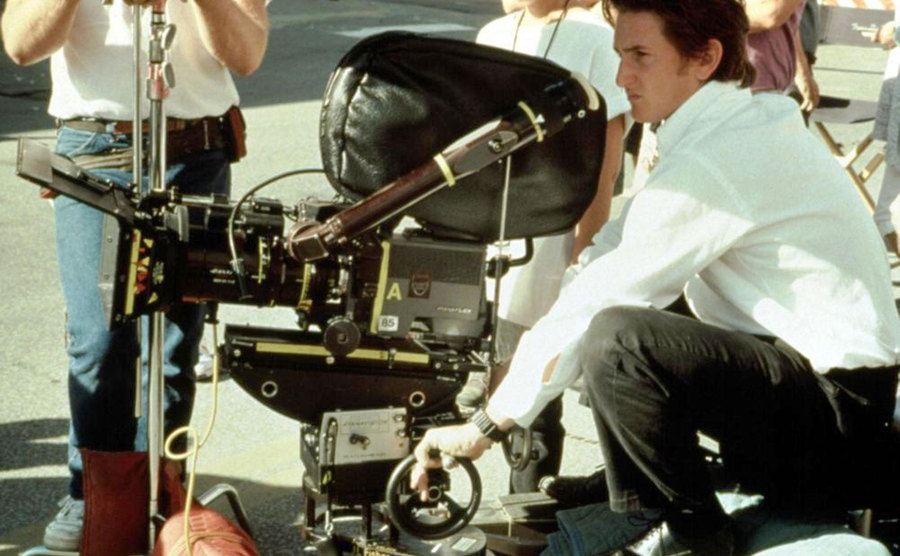 A photo of Sean Penn behind the scenes.