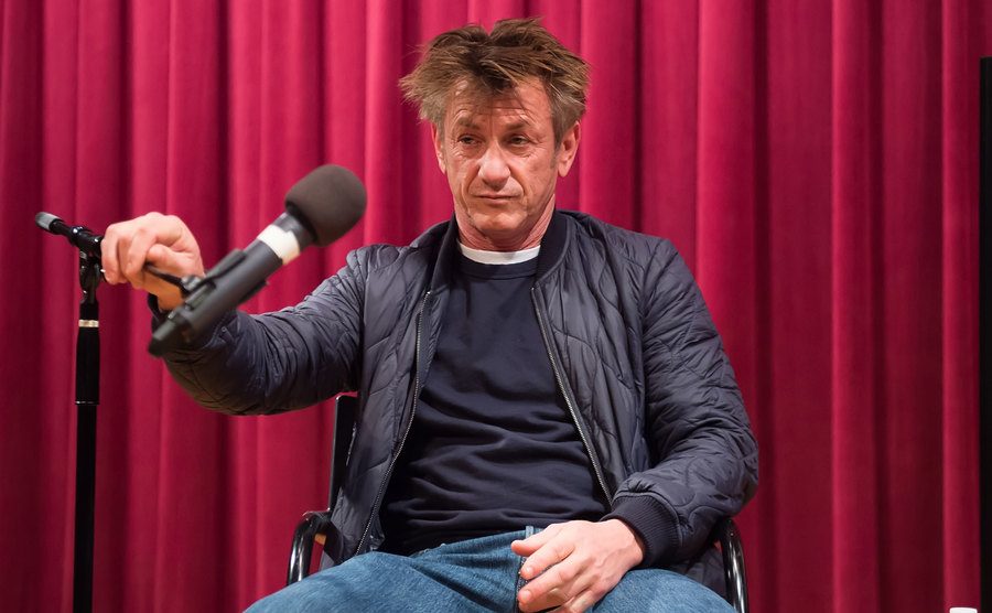Sean Penn discusses his novel on stage.
