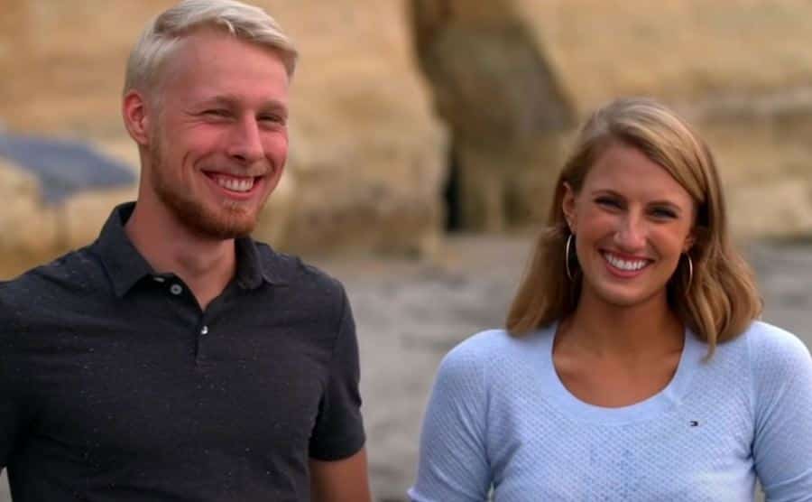 Ethan and Olivia smile during an interview.