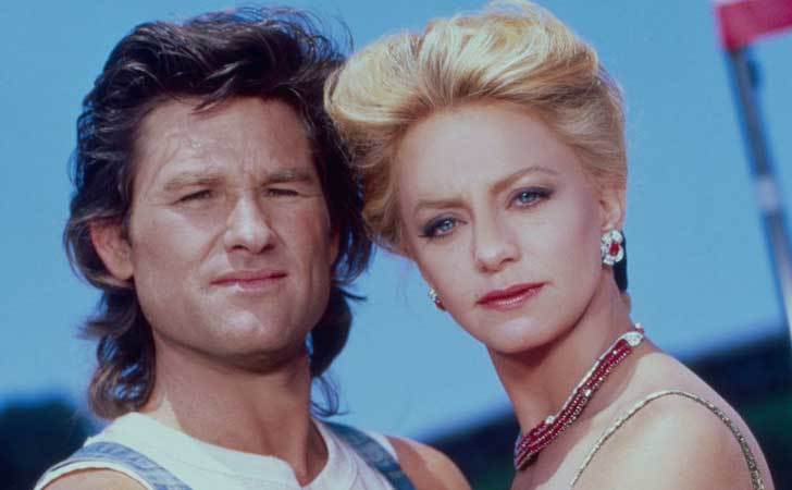 Goldie Hawn and Kurt Russell pose for a portrait. 