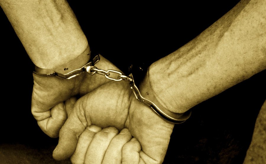 An image of a man in handcuffs.