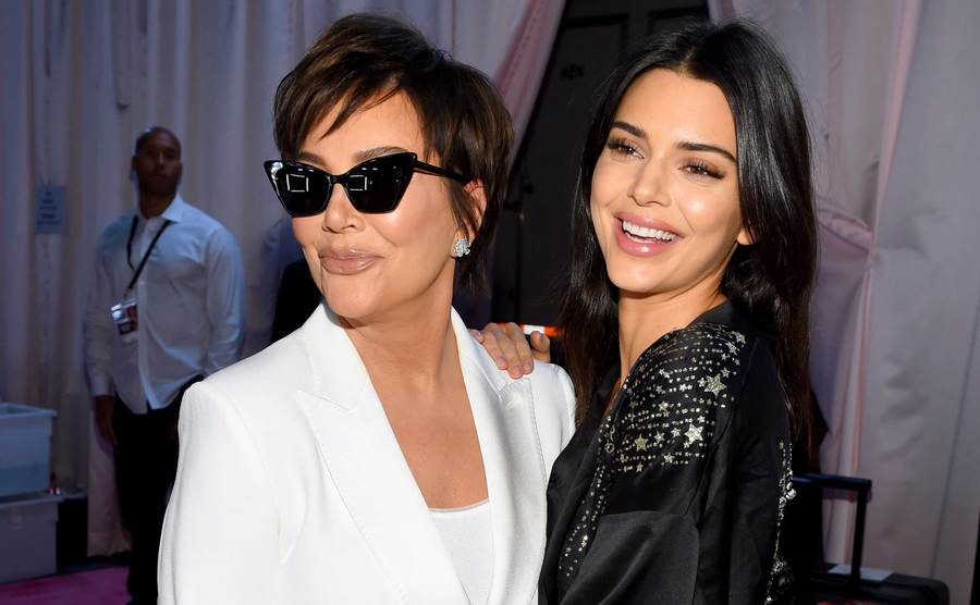 Kris Jenner and Kendall Jenner pose backstage during the Victoria's Secret Fashion Show. 