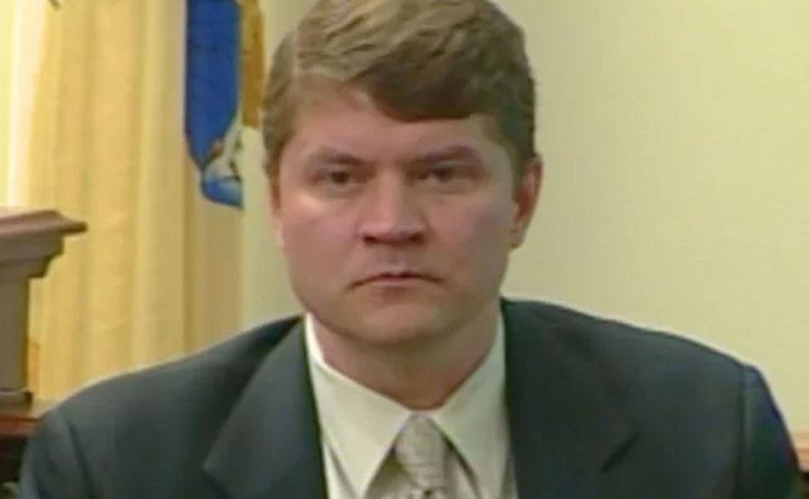 A video still of Dr. Bradley Miller testifying in court.