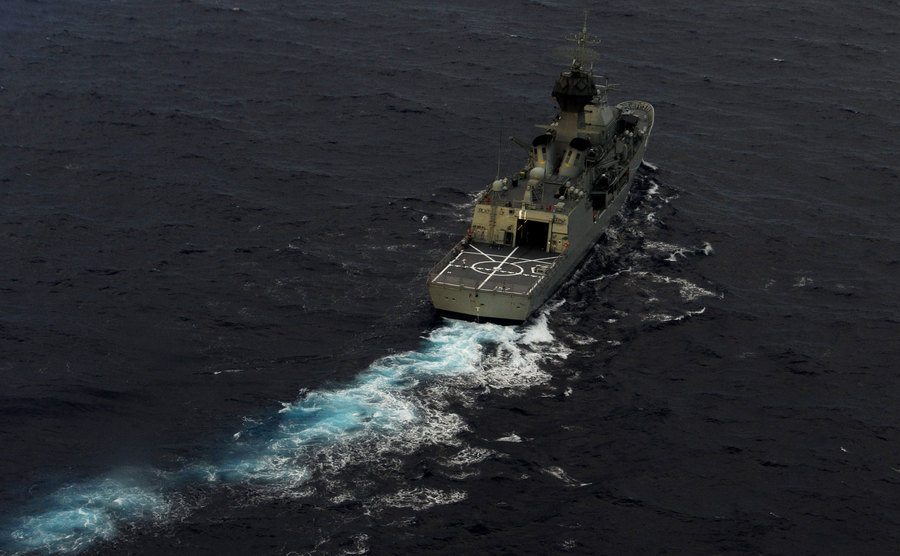 A ship searches for remains in the sea.